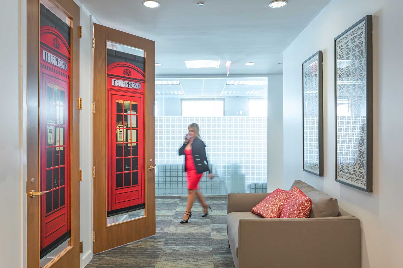 Hallway with phone-booth doors at Quest 2525 Ponce, Coral Gables